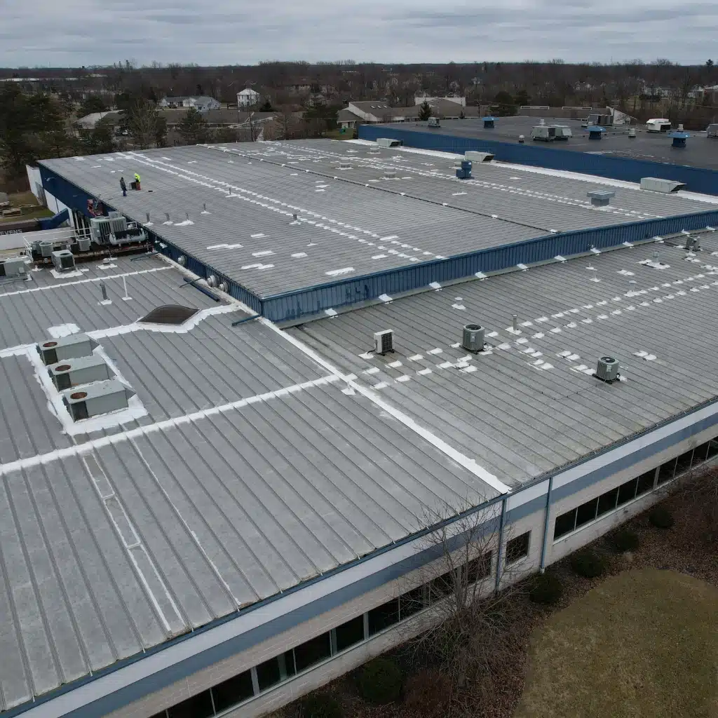 Premier National Roofing team on-site during commercial roofing project